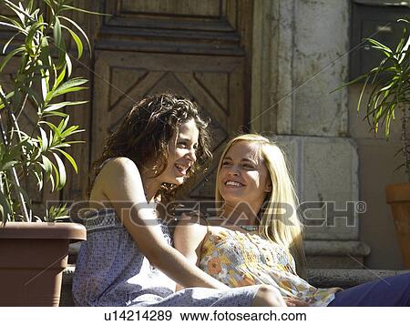 Girls laughing in sunshine View Large Photo Image Stock Photo - Girls laughing in sunshine. Fotosearch