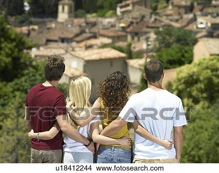 Picture - Group looking at view. Fotosearch