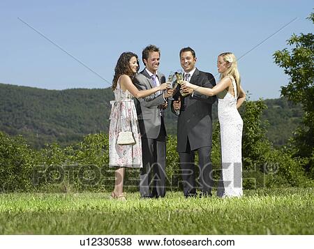 Wedding party toast View Large Photo Image Stock Photo - Wedding party toast. Fotosearch
