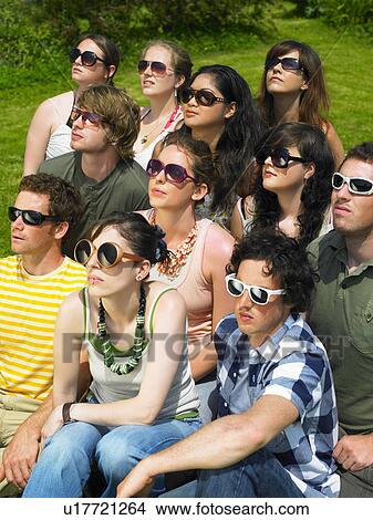 Group of people wearing sunglasses View Large Photo Image Picture - Group of people wearing sunglasses. Fotosearch