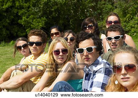 Group of people wearing sunglasses View Large Photo Image Stock Photo - Group of people wearing sunglasses. Fotosearch