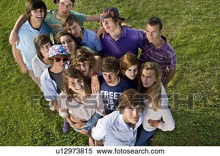Teen group portrait standing looking up View Large Photo Image Stock Photography - Teen group portrait standing looking up. Fotosearch