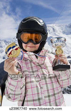A girl with trophies View Large Photo Image Stock Image - A girl with trophies. Fotosearch
