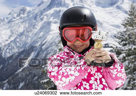 A girl with trophy View Large Photo Image Stock Image - A girl with trophy. Fotosearch