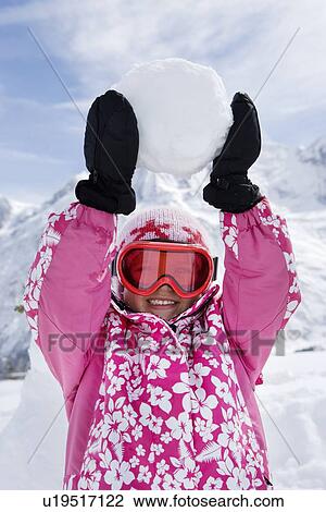 Girls with a snowball View Large Photo Image Stock Image - Girls with a snowball. Fotosearch
