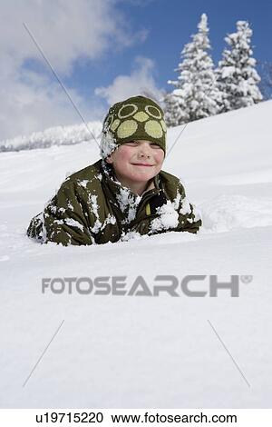 Portrait of boy in the snow View Large Photo Image Stock Image - Portrait of boy in the snow. Fotosearch
