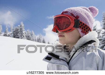 Portrait of girl with hat and goggles View Large Photo Image Stock Photography - Portrait of girl with hat and goggles. Fotosearch