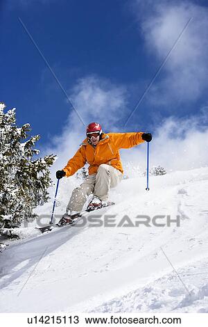 Skier in powder snow View Large Photo Image Stock Image - Skier in powder snow. Fotosearch