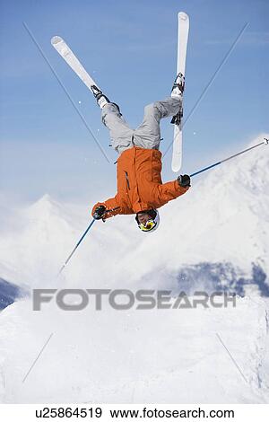 Stock Photo - Skier jumping upside-down. Fotosearch