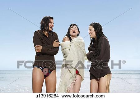 Picture - Three girls by the sea. Fotosearch