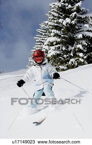 Young girl skiing View Large Photo Image Stock Image - Young girl skiing. Fotosearch