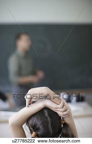 School girl raising hands in class View Large Photo Image Stock Image - School girl raising hands in class. Fotosearch
