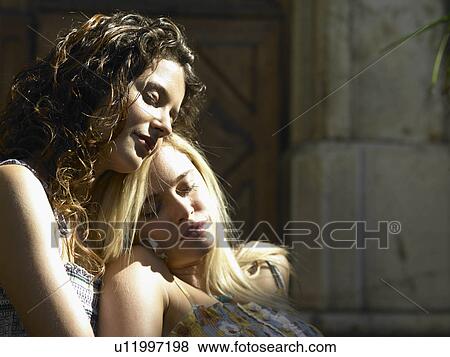 Stock Photo - Girls in sunshine. Fotosearch