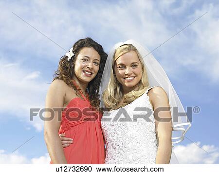 Portrait of bride and bridesmaid View Large Photo Image Stock Image - Portrait of bride and bridesmaid. Fotosearch