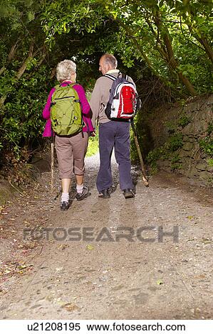 Stock Photography - Senior couple hiking. Fotosearch