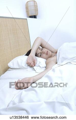 Stock Photograph - Woman asleep. Fotosearch