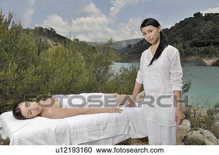 Stock Image - Woman having a massage . Fotosearch