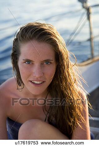 Young woman portrait on boat View Large Photo Image Stock Image - Young woman portrait on boat. Fotosearch