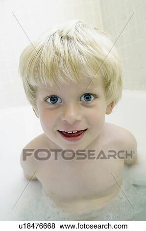 Portrait of boy in bath View Large Photo Image Stock Photo - Portrait of boy in bath. Fotosearch