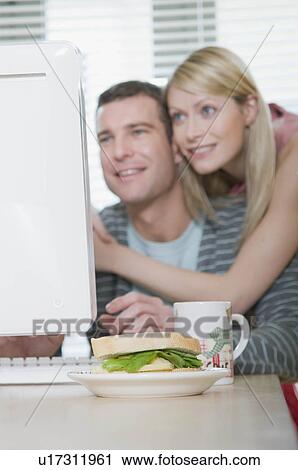 Couple working from home View Large Photo Image Stock Image - Couple working from home. Fotosearch