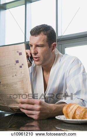 Portrait of a male reading the paper View Large Photo Image Stock Image - Portrait of a male reading the paper. Fotosearch