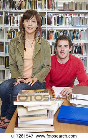 Portrait of students in library View Large Photo Image Stock Photo - Portrait of students in library. Fotosearch