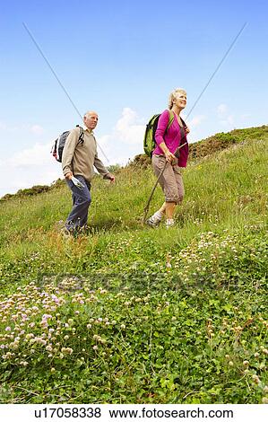 Senior couple hiking View Large Photo Image Stock Photo - Senior couple hiking. Fotosearch
