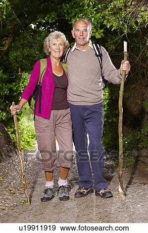 Senior couple hiking View Large Photo Image Stock Photo - Senior couple hiking. Fotosearch