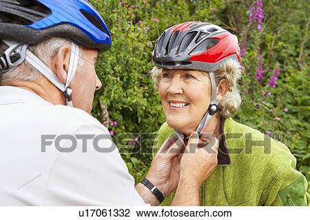 Senior couple with bicycles View Large Photo Image Stock Image - Senior couple with bicycles. Fotosearch