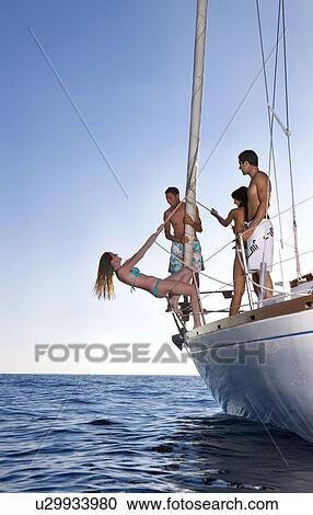 Group fun on sailboat View Large Photo Image Stock Image - Group fun on sailboat. Fotosearch