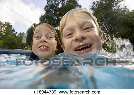 Girls and boy in swimming pool View Large Photo Image Stock Photo - Girls and boy in swimming pool. Fotosearch
