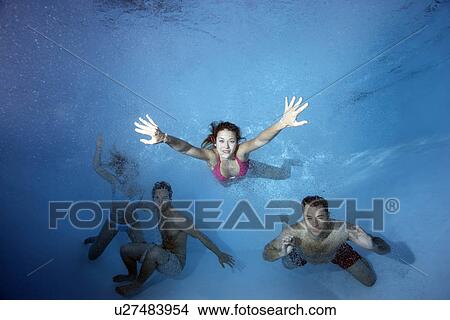 Group swimming underwater View Large Photo Image Picture - Group swimming underwater. Fotosearch