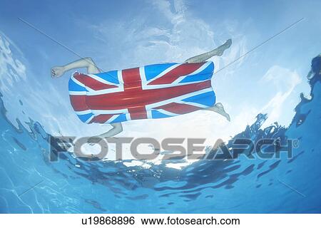 Underwater view of man in pool View Large Photo Image Stock Photograph - Underwater view of man in pool. Fotosearch