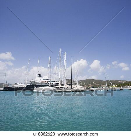 Cruise ship at a harbor View Large Photo Image Stock Image - Cruise ship at a harbor. Fotosearch