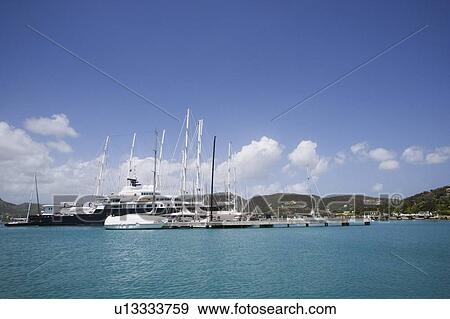 Cruise ship at a harbor View Large Photo Image Stock Photo - Cruise ship at a harbor. Fotosearch