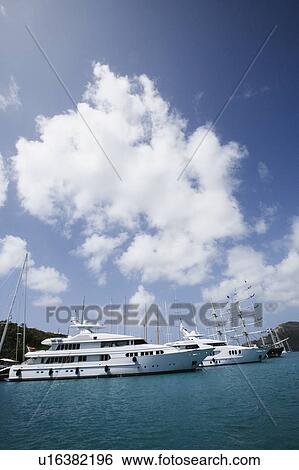 Cruise ship at a harbor View Large Photo Image Stock Photograph - Cruise ship at a harbor. Fotosearch