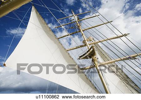 Low angle view of a sailing ship View Large Photo Image Stock Image - Low angle view of a sailing ship. Fotosearch