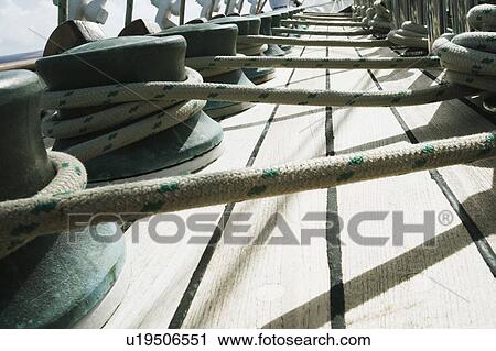 Ropes tied up with bollards in a boat View Large Photo Image Stock Image - Ropes tied up with bollards in a boat. Fotosearch