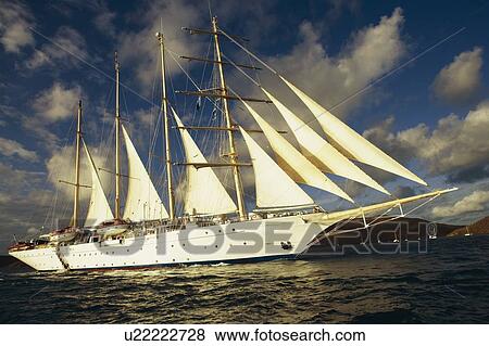 Sailboat in the sea View Large Photo Image Stock Photo - Sailboat in the sea. Fotosearch