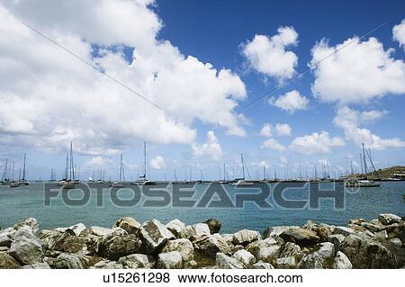 Boats in the sea View Large Photo Image Stock Photo - Boats in the sea. Fotosearch
