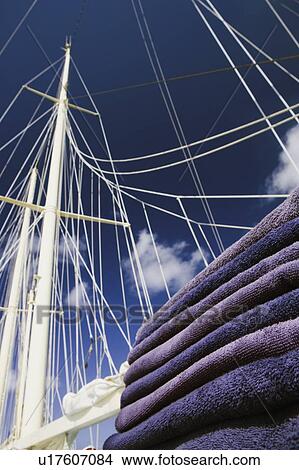 Low angle view of masts of a sailboat View Large Photo Image Picture - Low angle view of masts of a sailboat. Fotosearch