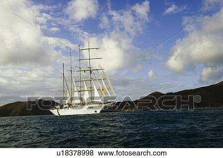 Sailboat in the sea View Large Photo Image Stock Photo - Sailboat in the sea. Fotosearch