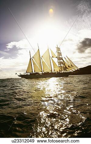 Sailboat in the sea View Large Photo Image Stock Photo - Sailboat in the sea. Fotosearch