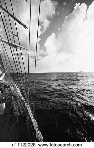 Ship sailing in the sea View Large Photo Image Stock Photo - Ship sailing in the sea. Fotosearch