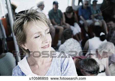 Stock Photography - Close-up of a mature woman smiling. Fotosearch