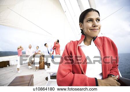 Close-up of a young woman smiling View Large Photo Image Stock Image - Close-up of a young woman smiling. Fotosearch