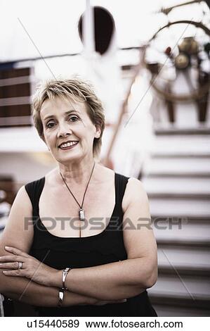 Portrait of a mature woman on a sailing ship and smiling View Large Photo Image Stock Photo - Portrait of a mature woman on a sailing ship and smiling. Fotosearch