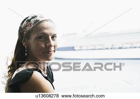 Portrait of a mid adult woman smiling View Large Photo Image Stock Photo - Portrait of a mid adult woman smiling. Fotosearch