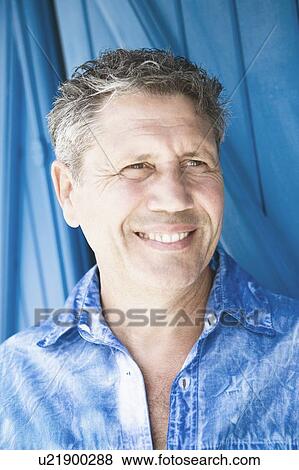 Close-up of a senior man smiling View Large Photo Image Stock Photo - Close-up of a senior man smiling. Fotosearch