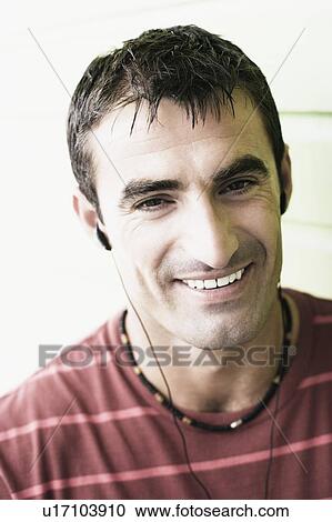 Portrait of a mid adult man smiling View Large Photo Image Stock Image - Portrait of a mid adult man smiling. Fotosearch